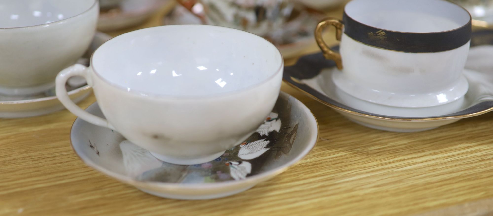 A group of Japanese ceramic teawares and plates, Meiji